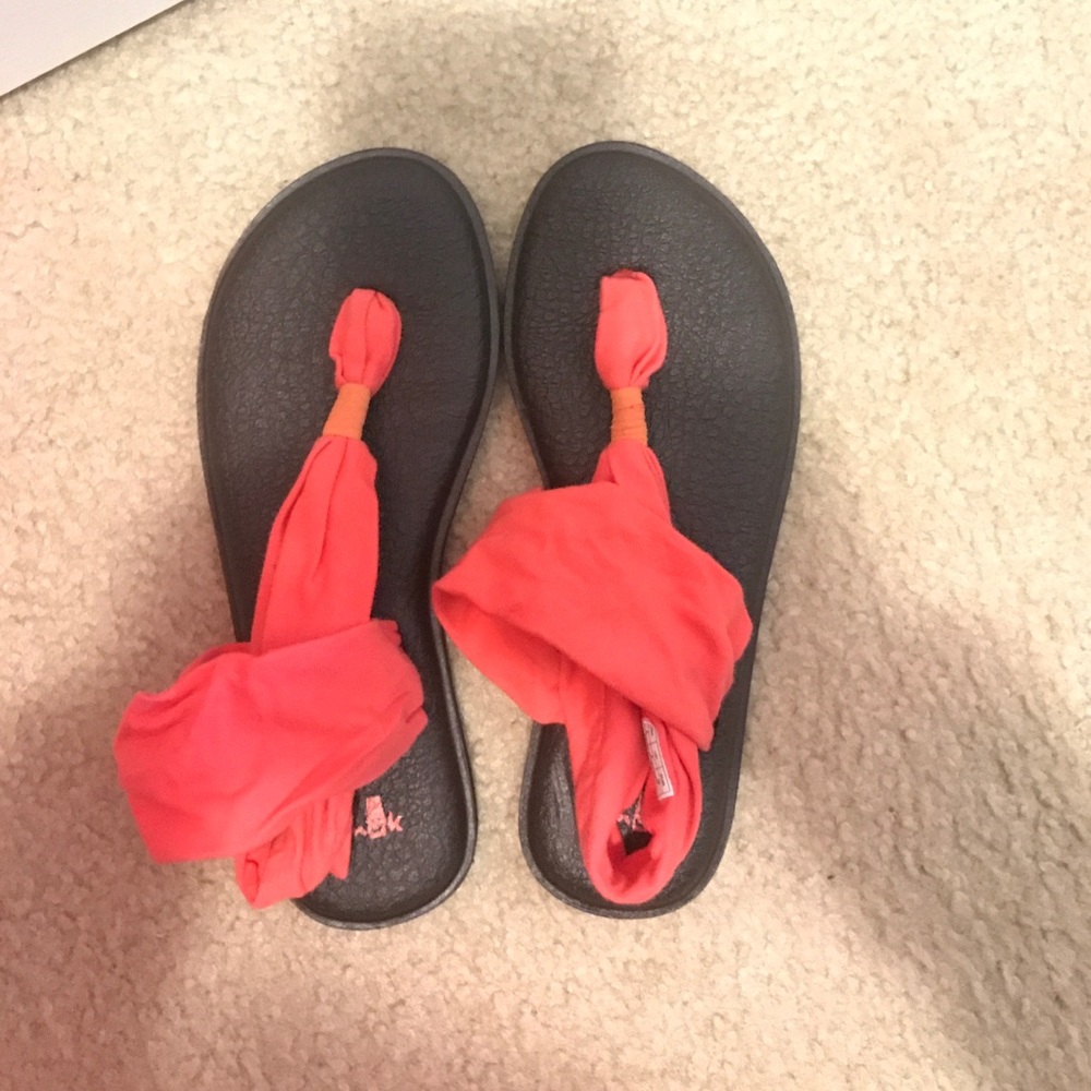Woman’s salmon colored sandal